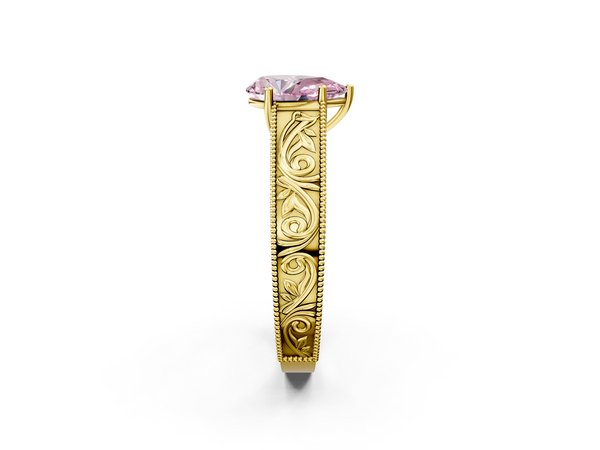 Yellow gold Fancy Pink Pear Cut Diamond Solitaire Ring with Engraved Band and Four-Prong Setting