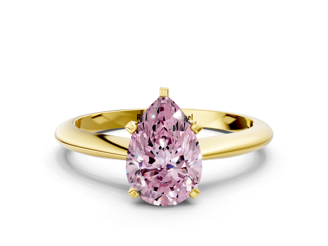 Yellow gold Fancy Pink Pear  Cut Solitaire Ring with Four-Prong Setting on a Classic Band_71