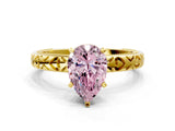Yellow gold Fancy Pink Pear  Solitaire Diamond Engagement Ring with XO Engraved Band and Four-Prong Setting 1