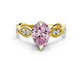Yellow gold Fancy Pink Pear  Solitaire Twist Band with Leaf Prong Setting