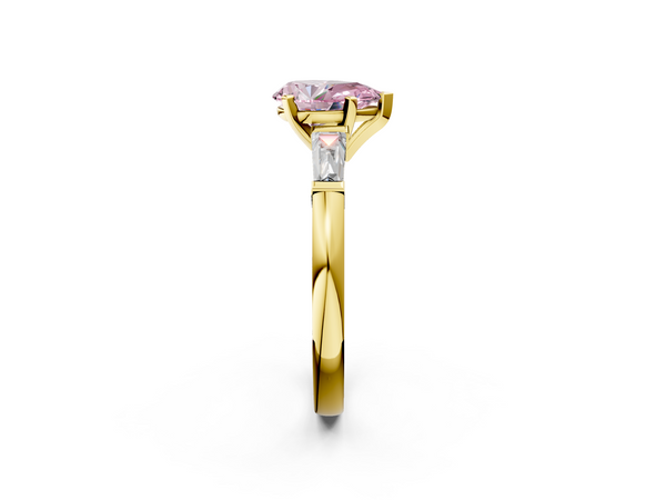Yellow gold Fancy Pink Pear  Solitaire with Tapered Baguette Side Stones on a Classic Band with Four-Prong Setting