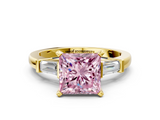 Yellow gold Fancy Pink Princess  Cut Diamond Solitaire Ring with Tapered Baguette Accents and Four-Prong Setting