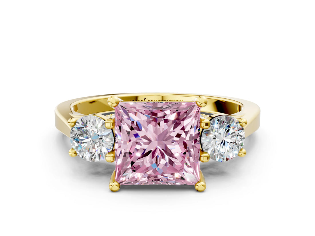 Yellow gold Fancy Pink Princess Cut Diamond Three-Stone Engagement Ring with Prong Setting and Pavé Band