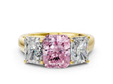 Yellow gold Fancy Pink Radiant Cut Three-Stone Diamond Ring with Prong Setting on a Classic Band_12