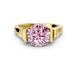 Yellow gold Fancy Pink Round Cut Brilliant Solitaire Diamond Ring with Channel Set Band and Bar Prong Setting