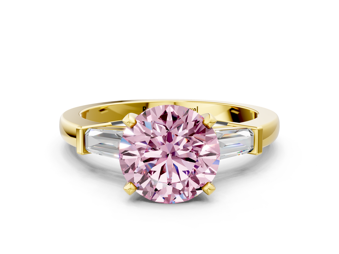 Yellow gold Fancy Pink Round  Cut Diamond Solitaire Ring with Tapered Baguette Accents and Four-Prong Setting