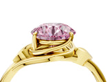 Yellow gold Fancy Pink Round Cut Diamond Solitaire Ring with Twist Band and Four-Prong Setting_34