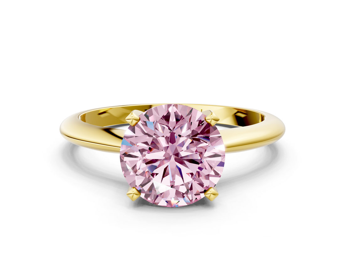Yellow gold Fancy Pink Round  Cut Solitaire Ring with Four-Prong Setting on a Classic Band