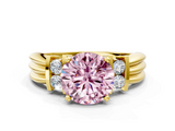 Yellow gold Fancy Pink Round  Cut Three-Stone Channel Set Ring with Bar Prongs