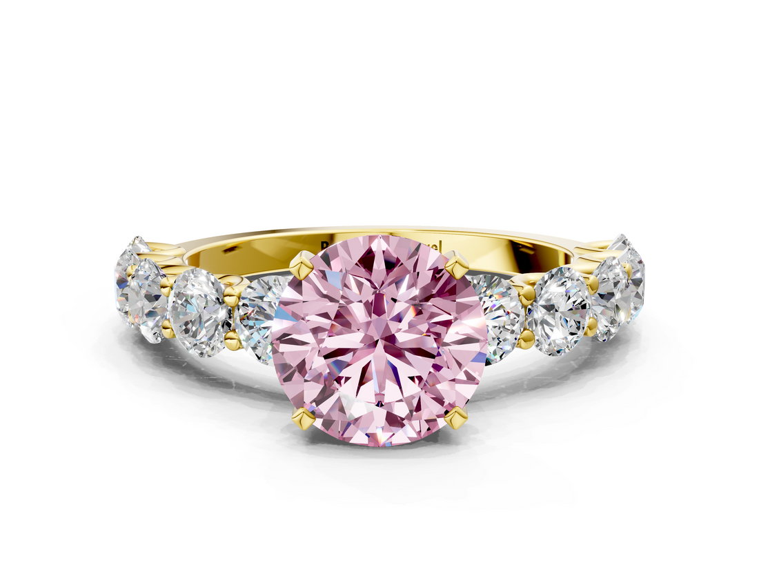Yellow gold Fancy Pink Round  Diamond Prong Setting with Side Stones on a Pave Band