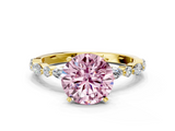 Yellow gold Fancy Pink Round  Solitaire with Side Stones on a Pavé Band and Four-Prong Setting