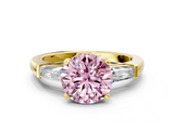 Yellow gold Fancy Pink Round  Solitaire with Tapered Baguette Side Stones on a Classic Band with Four-Prong Setting