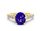 Yellow gold Fancy White Oval Cut Tanzanite Solitaire Ring with Cathedral Setting and Pavé Band