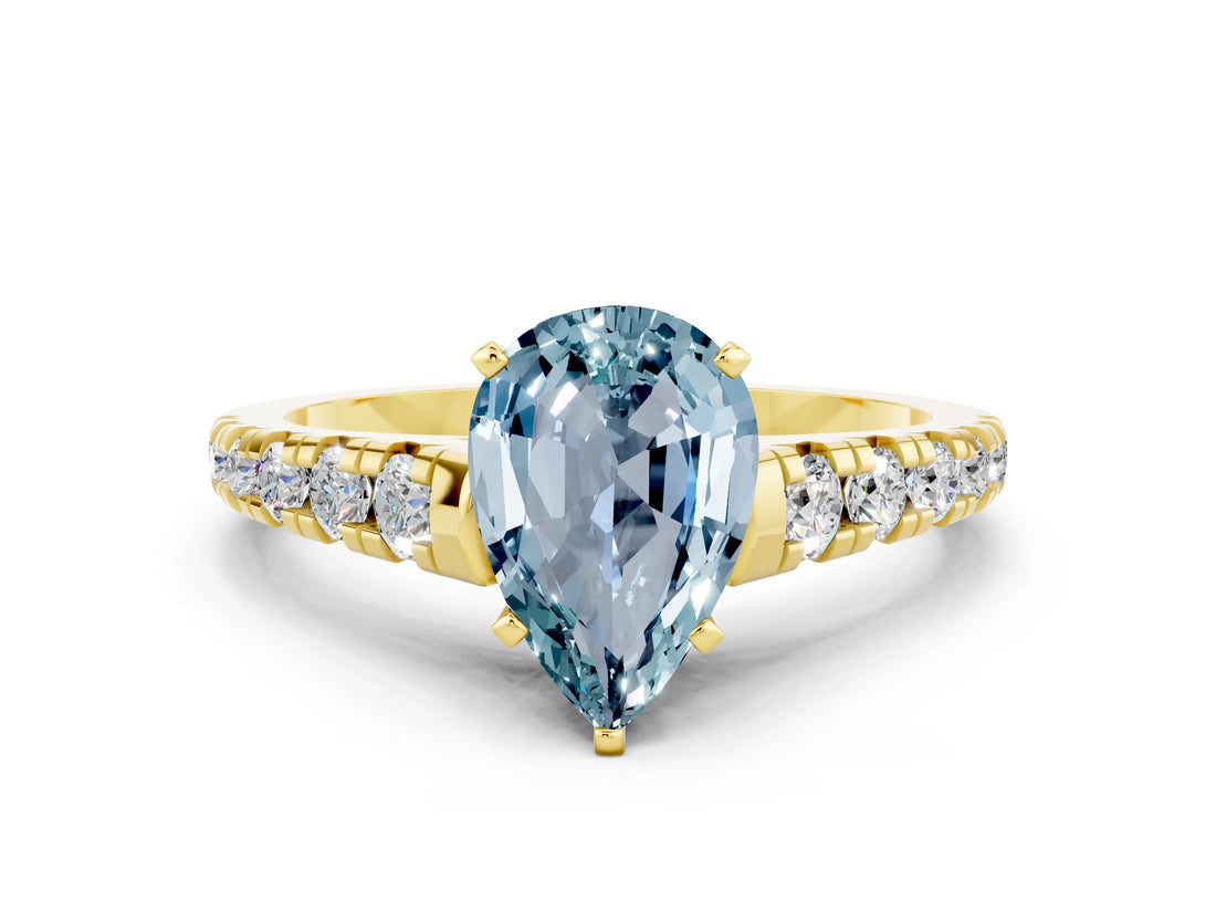 Yellow gold Fancy White Pear Cut Aquamarine Solitaire Ring with Cathedral Setting and Pavé Band