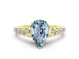 Yellow gold Fancy White Pear Cut Aquamarine Solitaire Ring with Cathedral Setting and Pavé Band