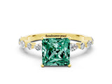 Yellow gold Fancy White Princess Cut Green Sapphire Solitaire with Side Stones on a Pavé Band and Four-Prong Setting