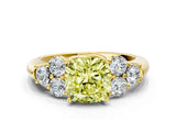 Yellow gold Fancy Yellow Cushion  Cut Diamond Cluster Ring with Round Accent Stones and Prong Setting on a Classic Band_48
