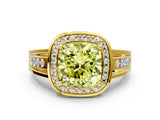 Yellow gold Fancy Yellow Cushion Cut Diamond Halo Ring with Split Shank and Bezel Accents and Prong Setting