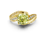 Yellow gold Fancy Yellow Cushion Cut Diamond Solitaire Ring with Prong Setting and Twisted Pavé Band