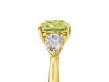 Yellow gold Fancy Yellow Cushion Cut Diamond Three-Stone Ring with Pear Side Stones and Four-Prong Setting_89