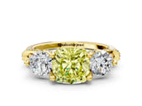 Yellow gold Fancy Yellow Cushion Cut Diamond Three-Stone Ring with Prong Setting and Pavé Band