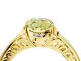 Yellow gold Fancy Yellow Cushion  Cut Halo Diamond Ring with Channel Set Band and Four-Prong Setting_56