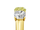 Yellow gold Fancy Yellow Cushion Cut Three-Stone Diamond Ring with Prong Setting on a Classic Band_17