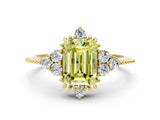 Yellow gold Fancy Yellow Emerald Cut Brilliant Diamond with Cluster Setting on a Beaded Band and Four-Prong Setting
