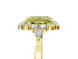 Yellow gold Fancy Yellow Emerald Cut Diamond Halo Ring with Pear Side Stones and Prong Setting_55