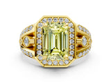 Yellow gold Fancy Yellow Emerald Cut Diamond Halo Ring with Split Shank and Bezel Accents and Four-Prong Setting