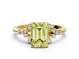 Yellow gold Fancy Yellow Emerald Cut Diamond Ring with Side Stones and Four-Prong Setting_109