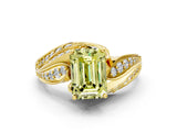 Yellow gold Fancy Yellow Emerald Cut Diamond Solitaire Ring with Prong Setting and Twisted Pavé Band