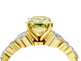 Yellow gold Fancy Yellow Emerald Cut Diamond Solitaire Ring with Side Stones and Four-Prong Setting_278
