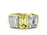 Yellow gold Fancy Yellow Emerald Cut Diamond Three-Stone Ring with Prong Setting and Textured Band