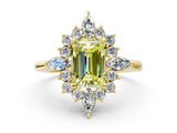 Yellow gold Fancy Yellow Emerald Cut Halo Diamond Cluster Ring with Marquise and Round Stones on a White Gold Band with Prong Setting
