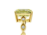 Yellow gold Fancy Yellow Emerald Cut Solitaire Diamond Ring with Infinity Twist Band and Four-Prong Setting_5