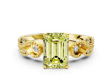 Yellow gold Fancy Yellow Emerald Cut Solitaire Milgrain Leaf Band with Prong Setting