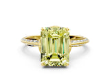 Yellow gold Fancy Yellow Emerald Cut Solitaire Split Shank Pave Diamond Engagement Ring with Four-Prong Setting