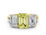 Yellow gold Fancy Yellow Emerald Cut Three-Stone Diamond Ring with Prong Setting on a Classic Band_12