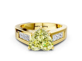Yellow gold Fancy Yellow Heart Cut Cut Channel Set Solitaire Ring with Four-Prong Setting