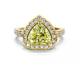 Yellow gold Fancy Yellow Heart Cut Diamond Halo Ring with Pavé Band and Prong Setting