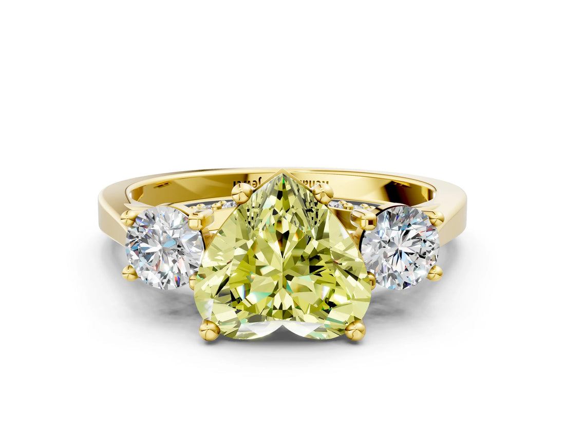 Yellow gold Fancy Yellow Heart Cut Diamond Three-Stone Engagement Ring with Prong Setting and Pavé Band