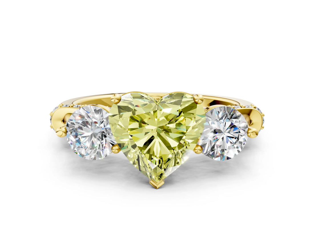 Yellow gold Fancy Yellow Heart Cut Diamond Three-Stone Ring with Prong Setting and Pavé Band