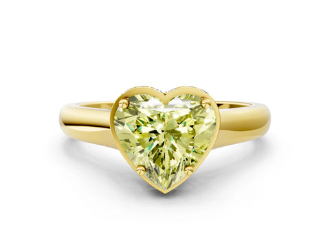 Yellow gold Fancy Yellow Heart Cut Solitaire Diamond Engagement Ring with Four-Prong Setting and Tapered Band