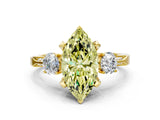 Yellow gold Fancy Yellow Marquise Cut Brilliant Three-Stone Diamond Ring with Pavé Band and Four-Prong Setting_3