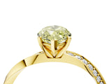 Yellow gold Fancy Yellow Marquise Cut Diamond Engagement Ring with Side Stone Accents and Four-Prong Setting_39