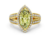 Yellow gold Fancy Yellow Marquise Cut Diamond Halo Ring with Split Shank Pavé Band and Four-Prong Setting