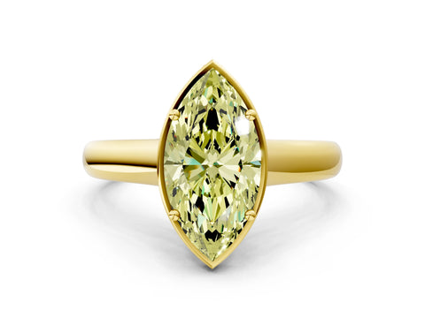 Yellow gold Fancy Yellow Marquise Cut Solitaire Diamond Engagement Ring with Four-Prong Setting and Tapered Band