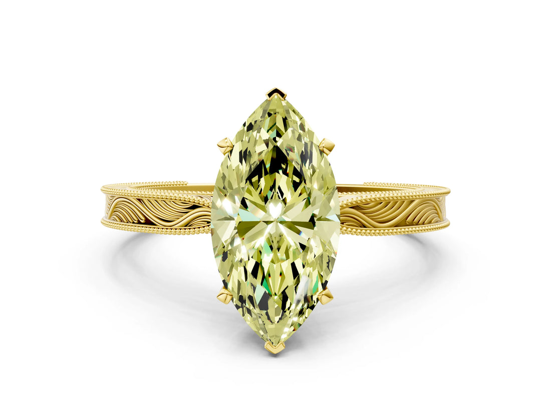 Yellow gold Fancy Yellow Marquise Cut Solitaire Milgrain Engraved Band with Four-Prong Setting
