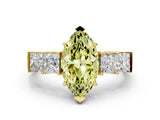 Yellow gold Fancy Yellow Marquise Cut Solitaire Princess Side Stone Engraved Band Prong Setting Ring